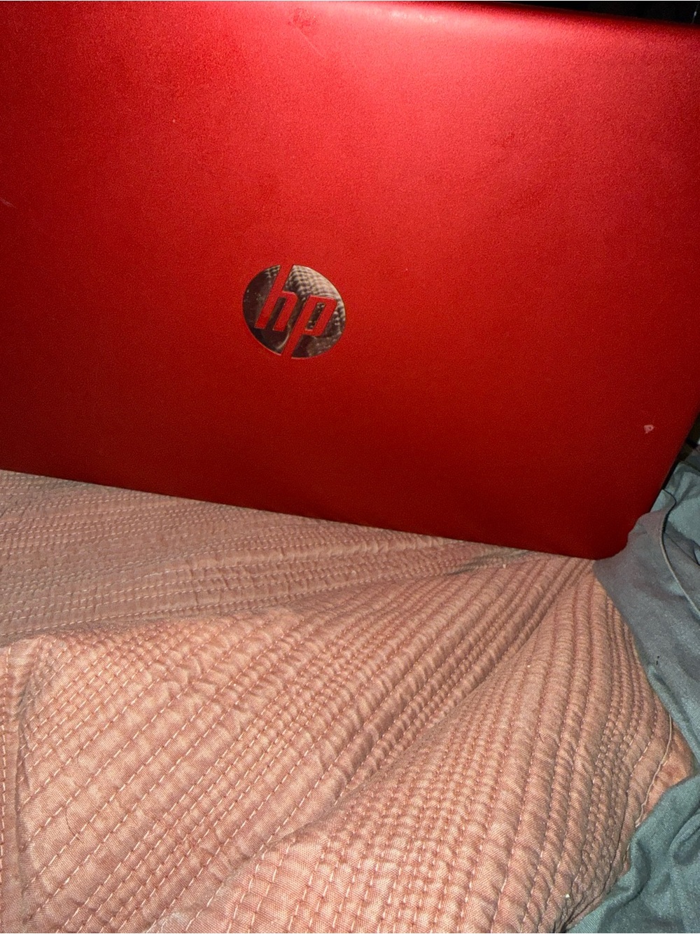 HP Red Laptop with Silver Logo